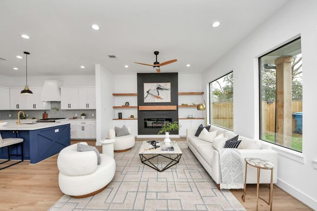 Abundant natural light poursthrough windows, creating a brightand inviting atmosphere. | Image 5