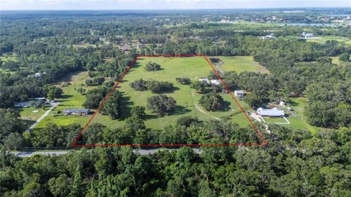 12135 Knights Griffin Rd, THONOTOSASSA, FL, 33592-3879 | Card Image