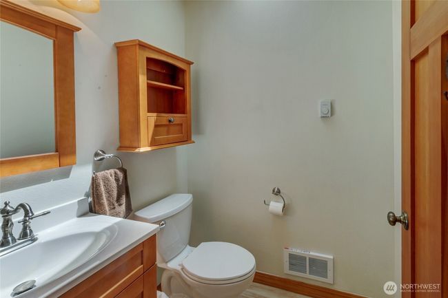Downstairs powder room. | Image 15