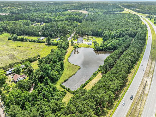 Aerial view of a main thoroughfare and a nearby body of water | Image 38