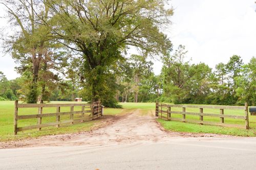 695 and 697 County Road 2309, Cleveland, TX, 77327-0284 | Card Image