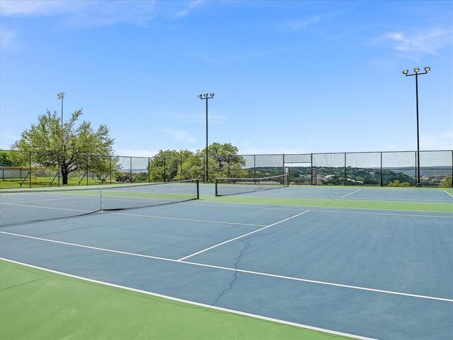 View of tennis court with community basketball court | Image 21
