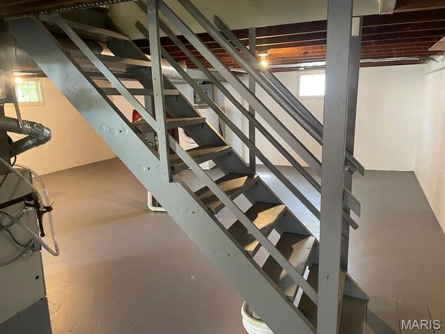 Below grade area featuring stairway | Image 23