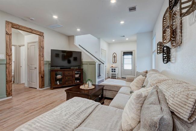 Here is another view of the flooring, molding, and doors! | Image 10