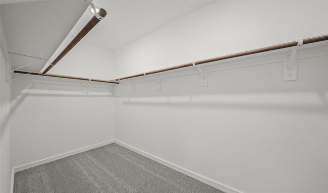 Walk-in closet in primary suiteh (*Photo not of actual home and used for illustration purposes only.) | Image 8