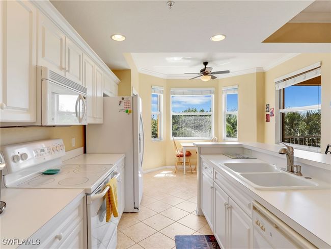 Kitchen and Eat-In Kitchen Area | Image 14