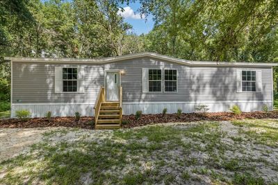 14331 Nw 77th Avenue, House other with 3 bedrooms, 2 bathrooms and null parking in Trenton FL | Image 1