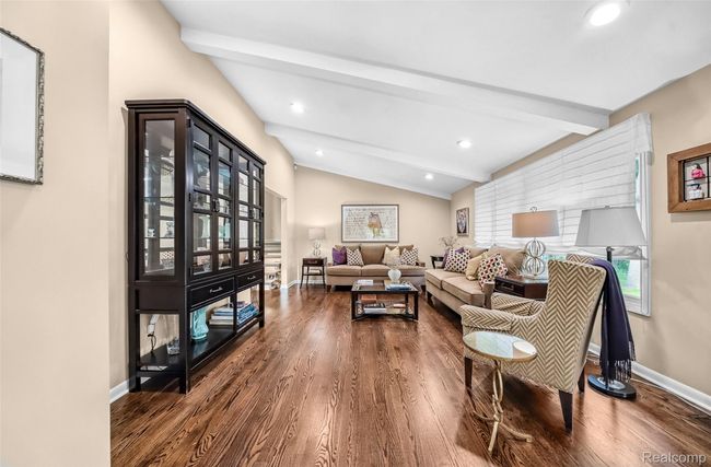 Spacious Living Area with Vaulted Ceiling | Image 6