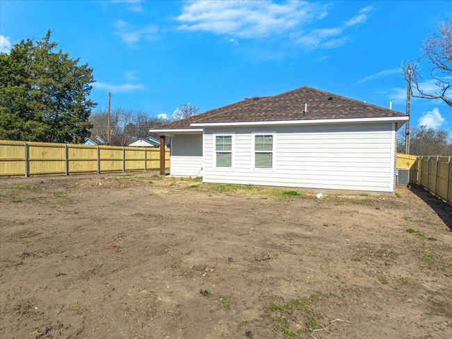 Back of property featuring a fenced backyard | Image 30