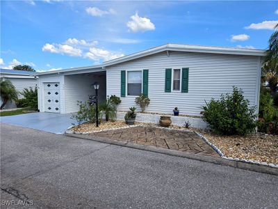 View of front of house featuring a garage | Image 1