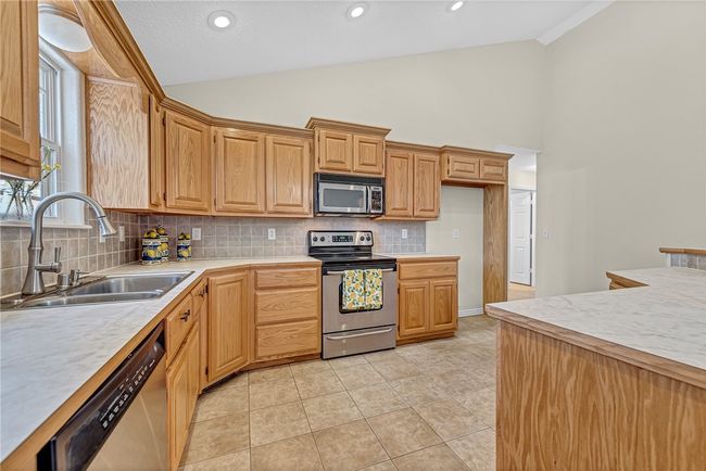 Convenient lasy susan in lower corner cabinet. | Image 7
