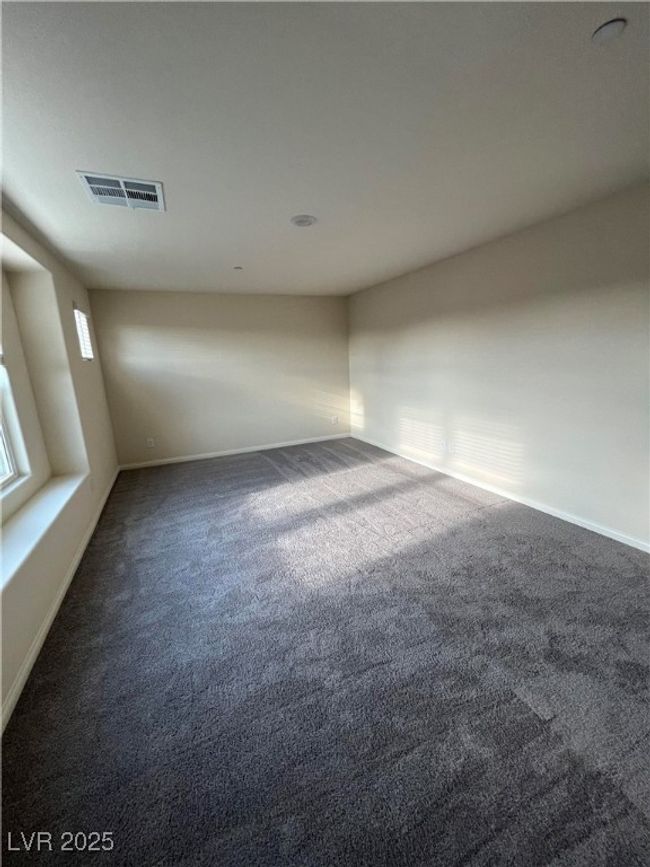 Unfurnished room featuring carpet and baseboards | Image 17