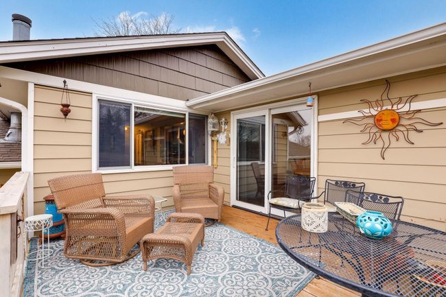 Large raised deck off kitchen eating area | Image 27