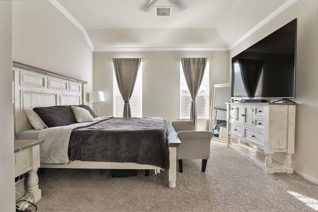 Welcome to the primary bedroom, the only bedroom located downstairs, offering ample privacy and comfort. | Image 15