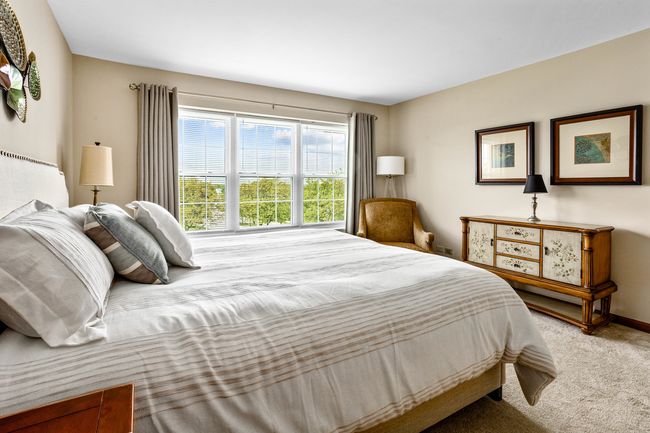 Primary suite with view of golf course | Image 10