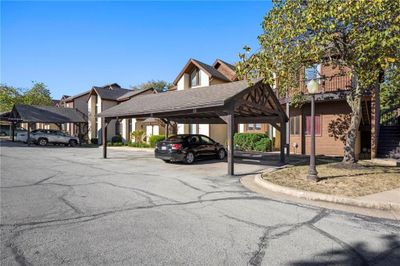 View of car parking with a carport | Image 1