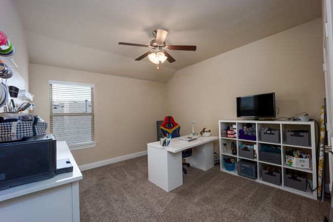 Upstairs Carpeted office with ceiling fan and vaulted ceiling | Image 18