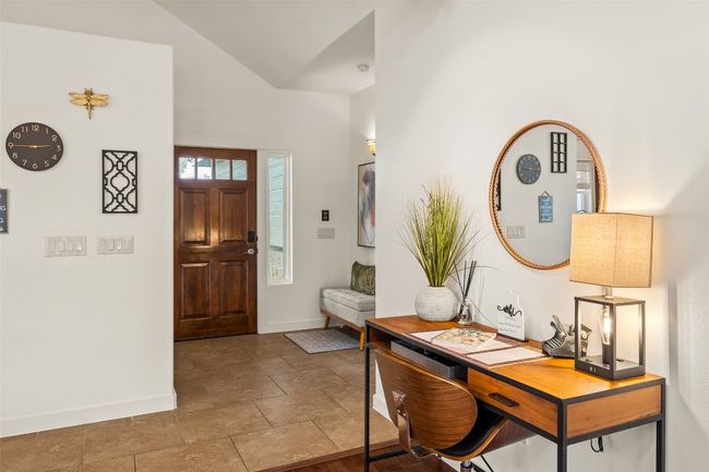 Foyer with baseboards and lofted ceiling | Image 4