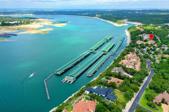 Aerial view of property's location with a nearby body of water | Image 34