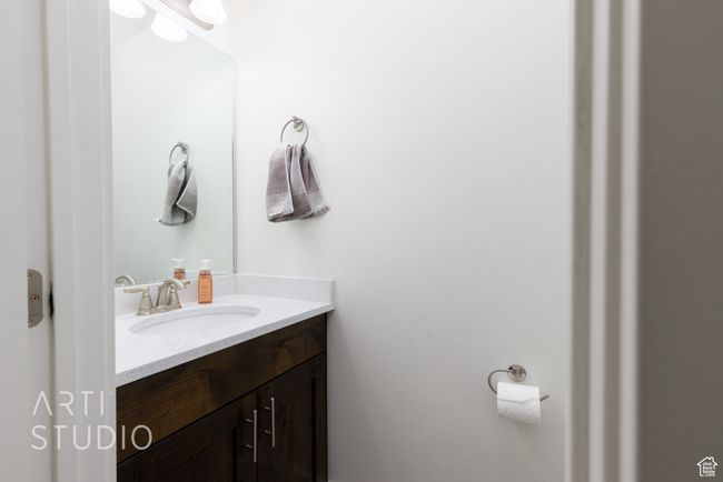 Bathroom featuring vanity | Image 9