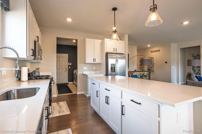 sleek, white kitchen | Image 6