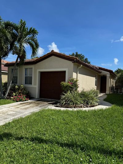 90 Nw 42nd Way, House other with 4 bedrooms, 2 bathrooms and null parking in Deerfield Beach FL | Image 1