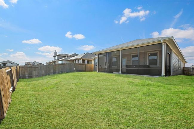 Fully fenced large backyard. | Image 29