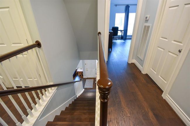 View from the second floor landing - the spacious laundry room is to the right | Image 27