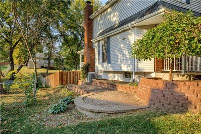 View of side of home featuring central AC and a patio area | Image 3