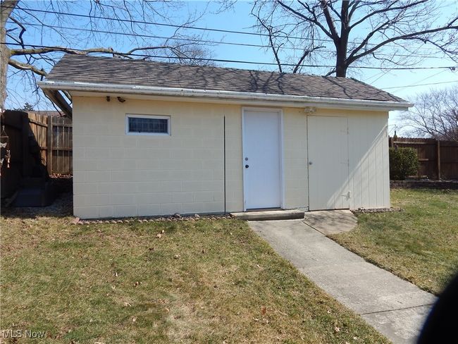 View of Concrete Block Outbuilding great for workshop, hobbies etc. with attached frame storage shed. | Image 34