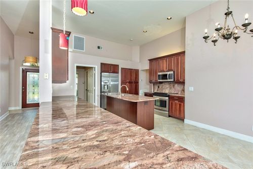 691 Melville Ct, NAPLES, FL, 34104-7880 | Card Image