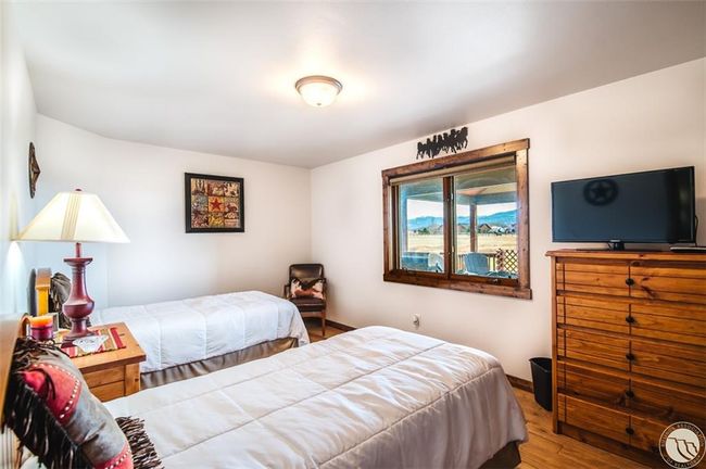 Bedroom 3 has views from your bed and a large closet | Image 20