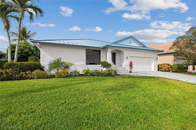 690 Amber Dr, House other with 3 bedrooms, 2 bathrooms and null parking in Marco Island FL | Image 2