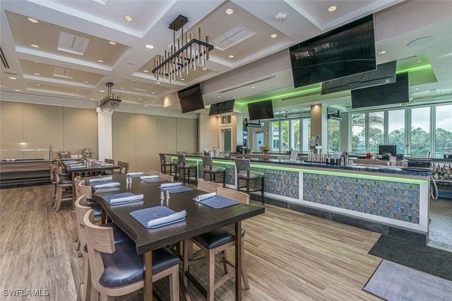 Dining area with beamed ceiling, light hardwood / wood-style floors, and coffered ceiling | Image 47
