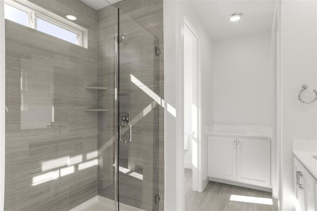 Full bathroom featuring a stall shower and vanity | Image 5
