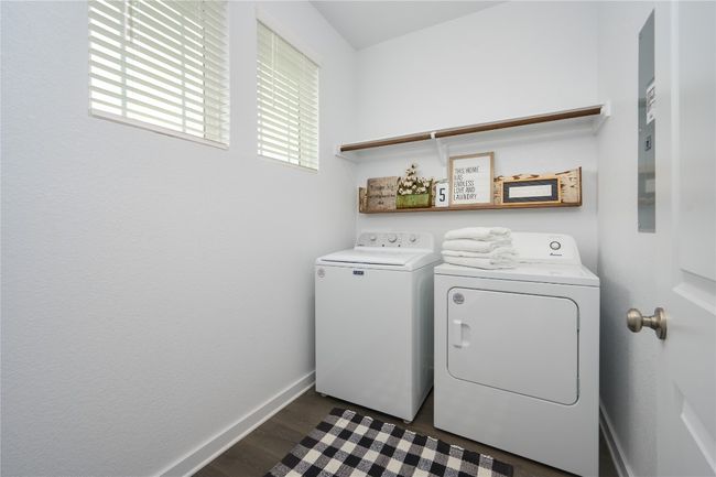 Laundry room with separate washer and dryer and dark wood-type flooring | Image 15
