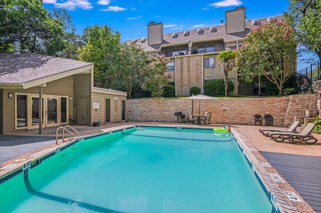 The home offers quick access to the sparkling community pool. | Image 11