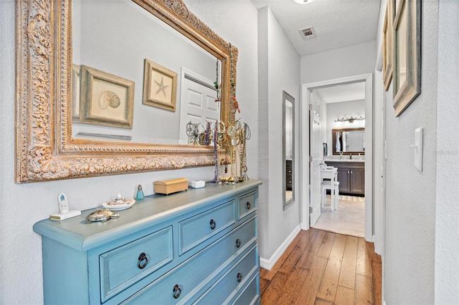 Hallway inside Primary bedroom to laundry and en-suite bathroom | Image 21