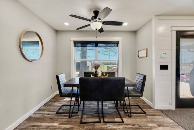 Dining area featuring recessed lighting, baseboards, ceiling fan, and wood finished floors | Image 9
