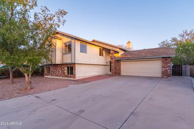 8825 W Sheridan Street, House other with 5 bedrooms, 3 bathrooms and null parking in Phoenix AZ | Image 1