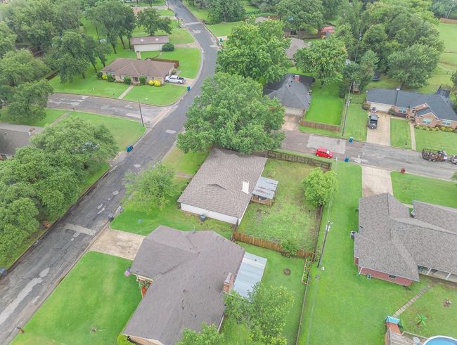 Aerial overview of property's location with nearby suburban area | Image 27