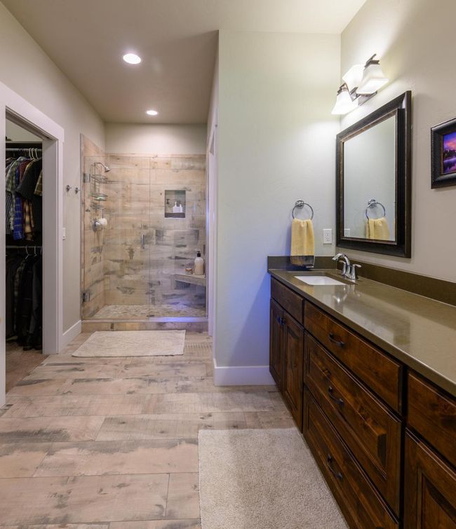Full bathroom with vanity, a tile shower, recessed lighting, a spacious closet | Image 20
