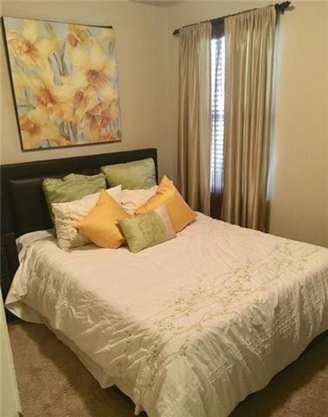 View of carpeted bedroom | Image 10