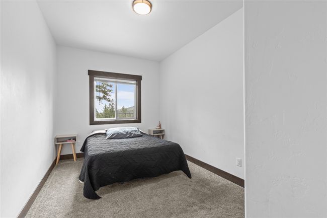 Bedroom with baseboards and carpet floors | Image 39