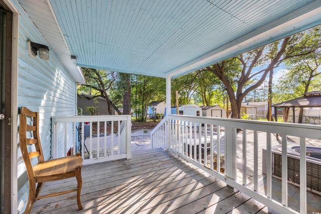 Deck featuring central AC unit and a gazebo | Image 21