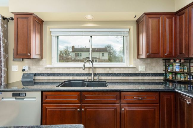 Delightful Kitchen Window with view of backyard | Image 6