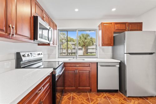 210-9091 Lime Bay Blvd, Tamarac, FL, 33321-8637 | Card Image