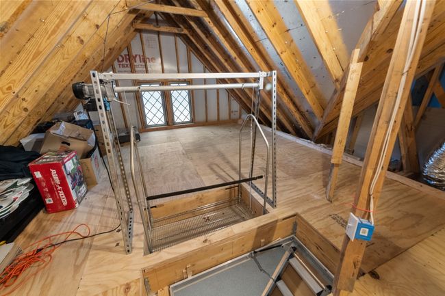 Custom lift system from garage into a spacious attic | Image 33