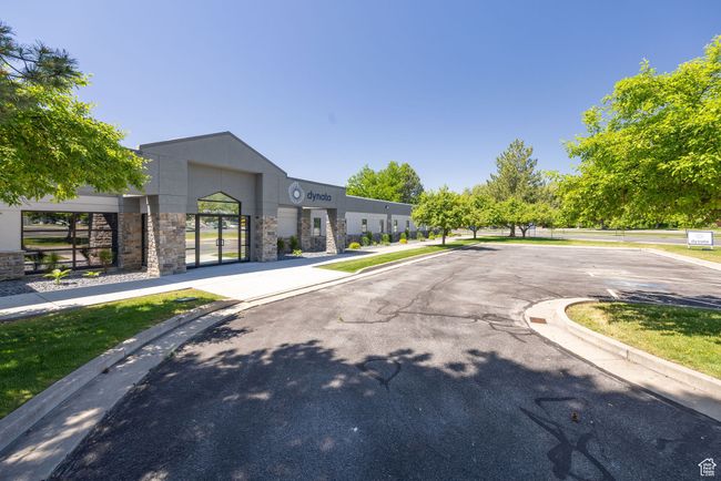View of asphalt road featuring curbs and sidewalks | Image 28