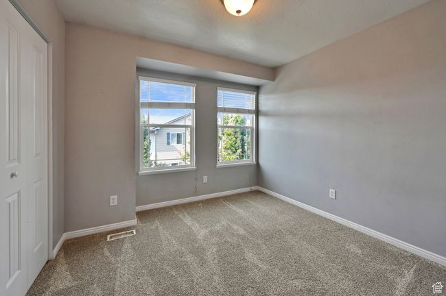 Unfurnished room with carpet flooring | Image 23